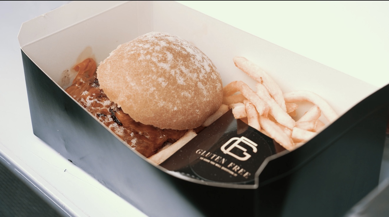 Our burger and fries packed to go
